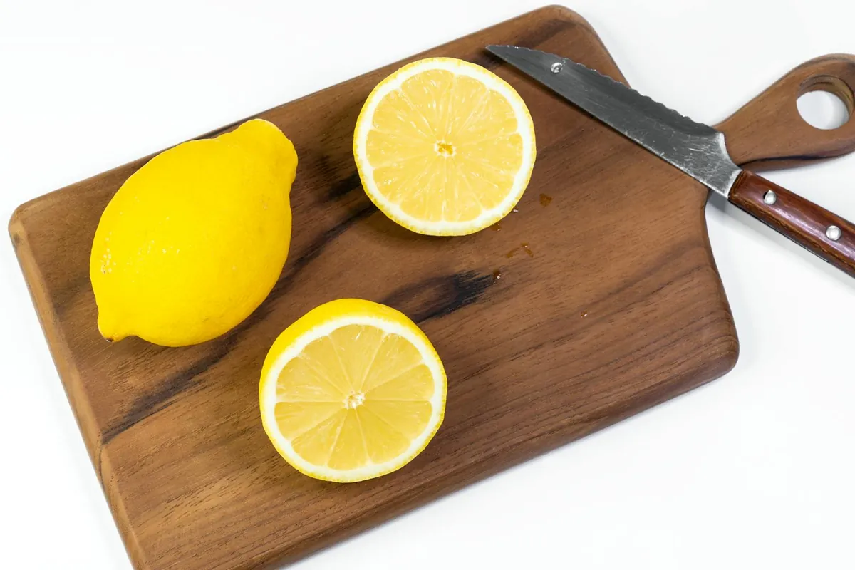 lemon halves on cutting board